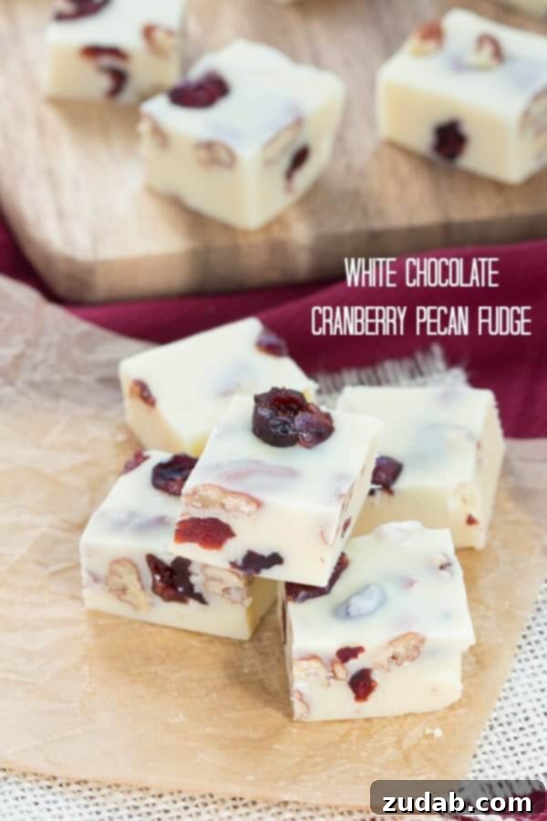 Vibrant Cranberry Orange Cake with Cream Cheese Frosting 10 Smooth white chocolate cranberry pecan fudge, ideal for holiday gifting or a festive treat.