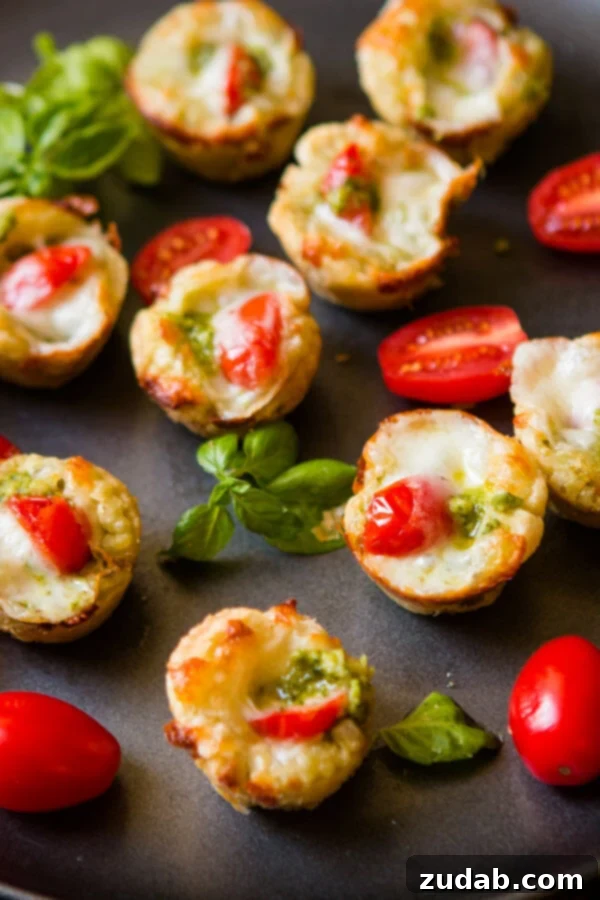 Speedy Cheesy Caprese Pesto Tarts 7 A vibrant assortment of grape tomatoes, freshly washed and ready for use in Caprese pesto tarts. This image highlights the fresh quality of the tomatoes.