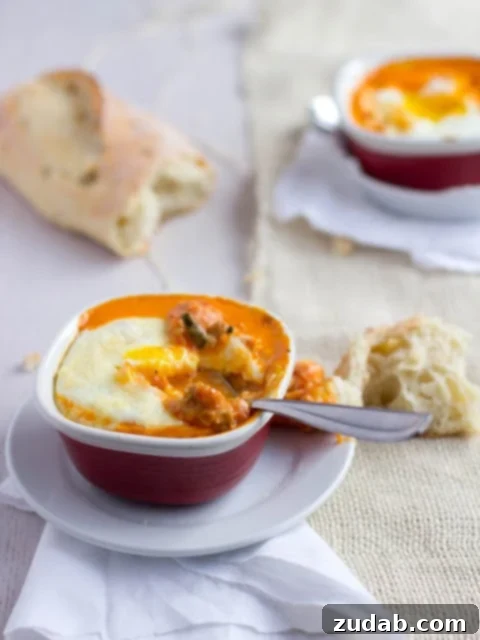 Perfect Baked Eggs 2 Baked eggs in ramekins, served with crusty bread