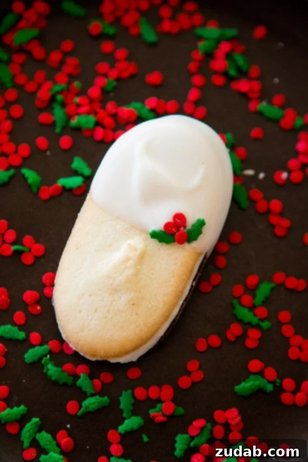 Simple to create, beautiful to behold: White Chocolate Dipped Mint Milanos bring joy to any table. ohsweetbasil.com These homemade White Chocolate Dipped Mint Milanos are incredibly easy to make and look stunning, perfect for holiday gatherings or thoughtful gifts. ohsweetbasil.com