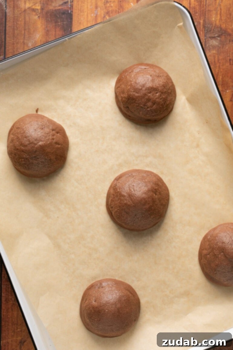 Gooey Chocolate Marshmallow Bites 12 Scooping cookie dough onto baking sheet
