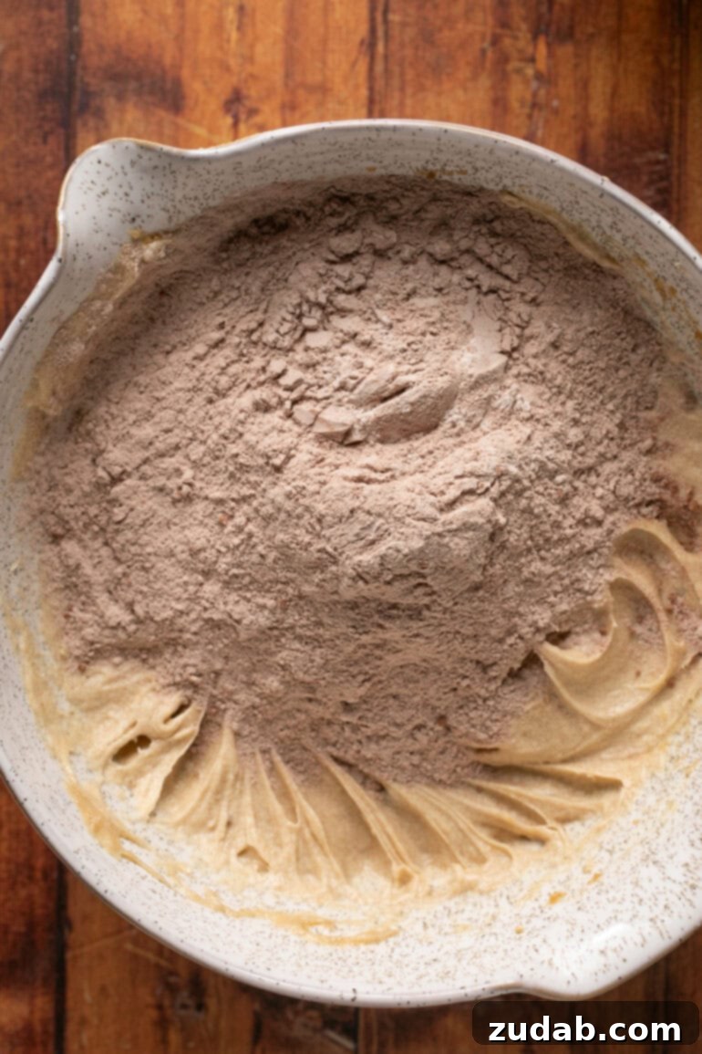 Gooey Chocolate Marshmallow Bites 10 Mixing cookie dough