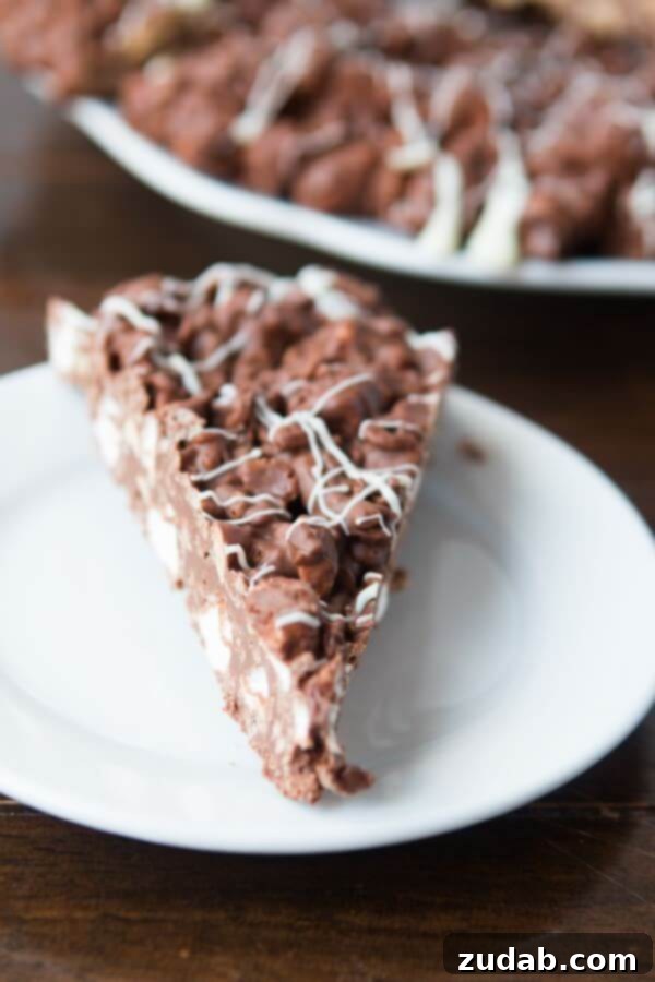 Delightful M&M Chocolate Pizza 6 Classic Rocky Road Chocolate Pizza, a simple and quick no-bake dessert that's ready in minutes.