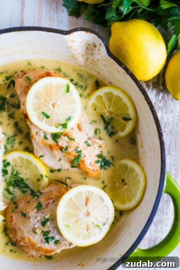 The Heart of the Dish: Creamy Lemon Garlic Sauce A close-up of the creamy lemon garlic sauce simmering in a pan, highlighting its rich texture