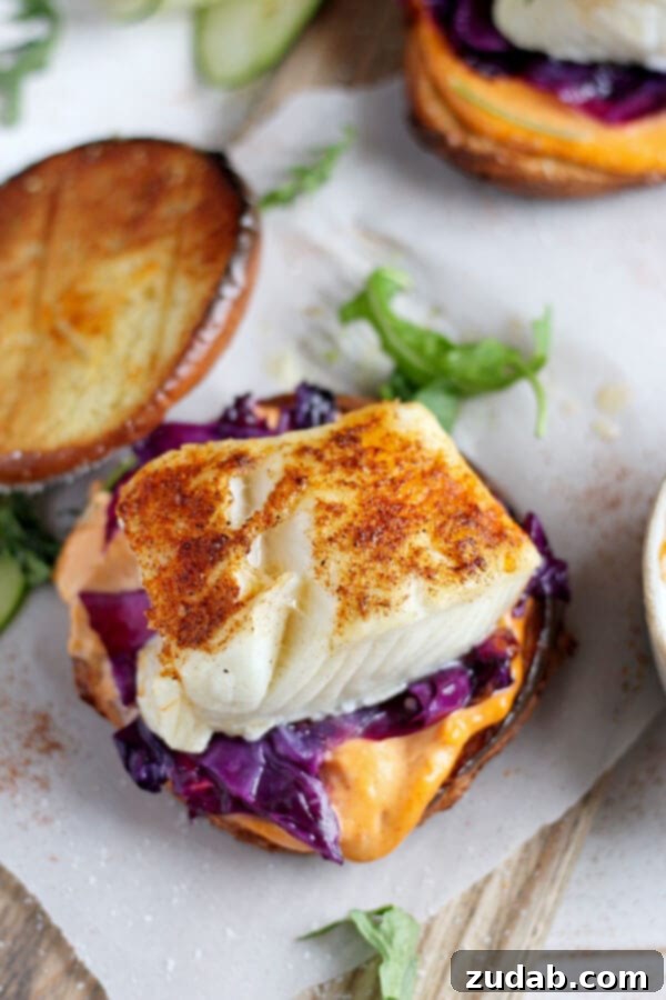 Quick Blackened Fish Burger: A Healthy Dinner Solution A vibrant side shot of the blackened fish burger, highlighting its fresh ingredients and perfectly toasted bun.