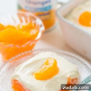 I grew up with this lemon mandarin orange jello salad at almost every single Thanksgiving and though I skip the shredded carrots this is a classic. ohsweetbasil.com