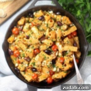 Zesty Greek Chicken Pasta Skillet 2 A beautifully plated Greek Chicken Pasta Skillet, garnished and ready to be enjoyed.