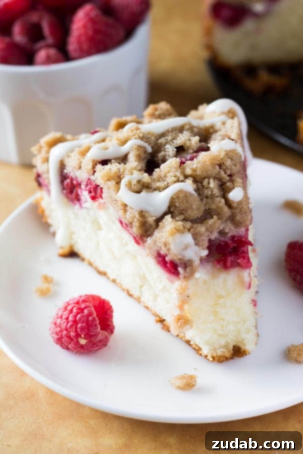 Golden Raspberry Crumble Squares 4 Rich, buttery, perfectly moist Raspberry Coffee Cake with Streusel Topping and Vanilla Glaze for breakfast or brunch.