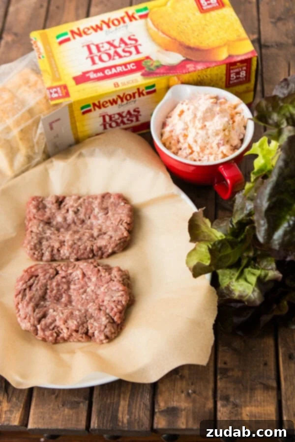 A Southern burger demands the perfect duo: rich, gooey pimento cheese and thick, golden Texas Toast. A visual delight from ohsweetbasil.com