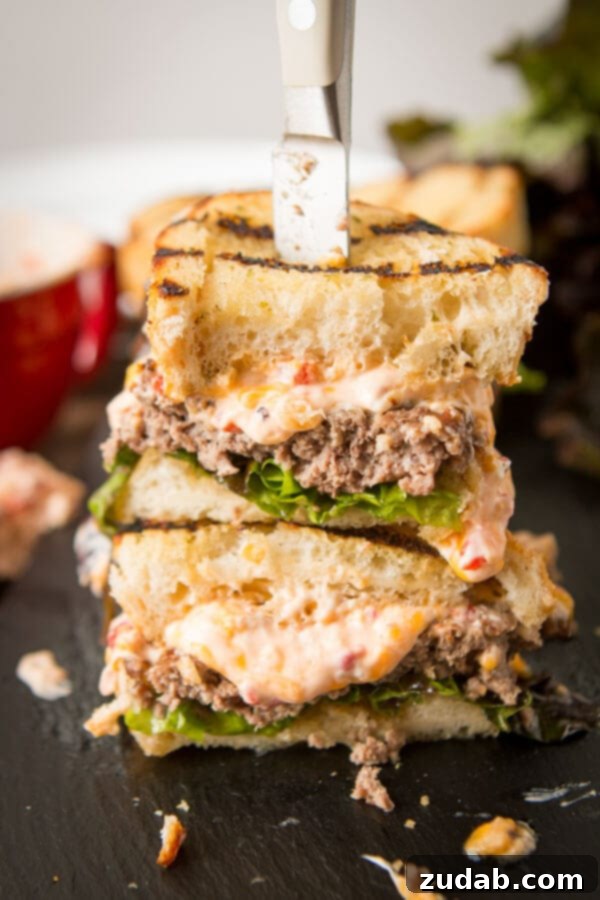 Savoring the last bite of the summer's best: a Southern Pimento Cheeseburger on grilled Texas Toast. A recipe from ohsweetbasil.com