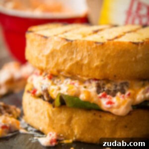 A vibrant image of a Southern Pimento Cheeseburger, showcasing the gooey cheese and Texas Toast.