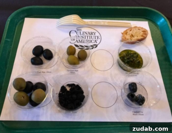 A diverse selection of California olives, ready to enhance any dish, from savory stuffed chicken to fresh pasta salads. Assortment of fresh and cured olives, showcasing the variety of colors and textures that make them a versatile culinary ingredient.