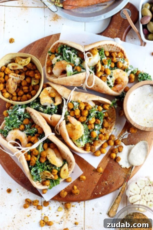 Ready-to-Eat Healthy Pita Dinner The finished plate: two roasted chickpea and garlic Caesar salad pitas ready to enjoy.