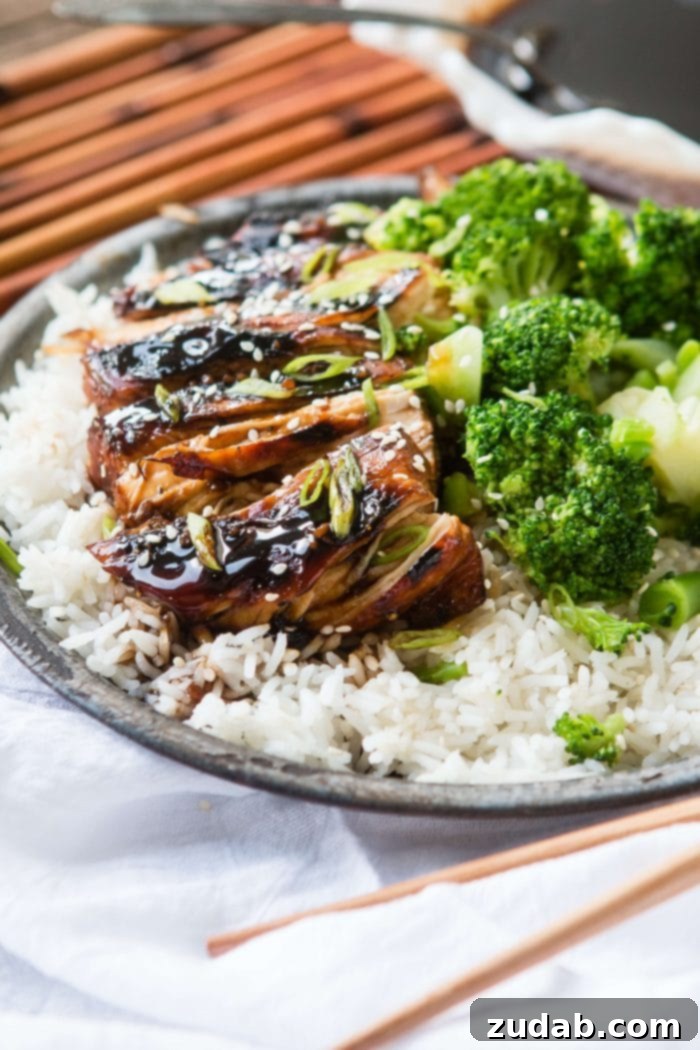 Succulent Sticky Asian Grilled Chicken Breasts, perfectly glazed with a homemade sauce, ready to be served.