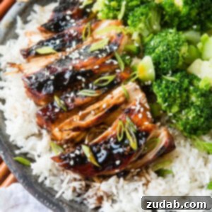 Sticky Asian sauce made with soy sauce and sweet chili sauce served over chicken and rice.