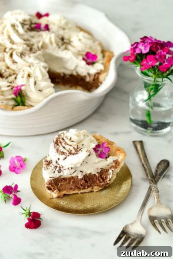 Homemade French Silk Pie: Rich Chocolate Cream in a Flaky Crust This Homemade French Silk Pie is made completely from scratch! A flaky pie shell is filled with an irresistibly chocolatey cream filling and topped with homemade whipped cream! The best part? It's even more delicious than the infamous version from Village Inn {or Baker's Square for my Midwest-dwelling friends}!
