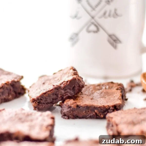 Decadent French Silk Pie Crafted At Home 4 Delicious Flourless Paleo Brownies on a cooling rack.