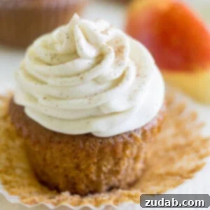 Warm Apple Cider Cupcakes with Spiced Cream Cheese Frosting 8 Apple cider cupcakes with Cinnamon Cream Cheese Frosting are a light and fluffy dessert just right for fall! The cupcake is made with apple cider!