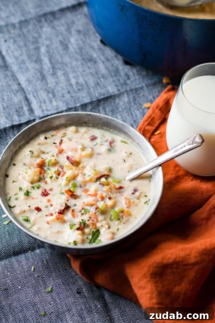 Easy One Pot Cauliflower Chowder 9 One pot cauliflower chowder is so good and such an easy soup recipe! It's full of carrots, creamy broth, cauliflower, and of course a little bacon! ohsweetbasil.com
