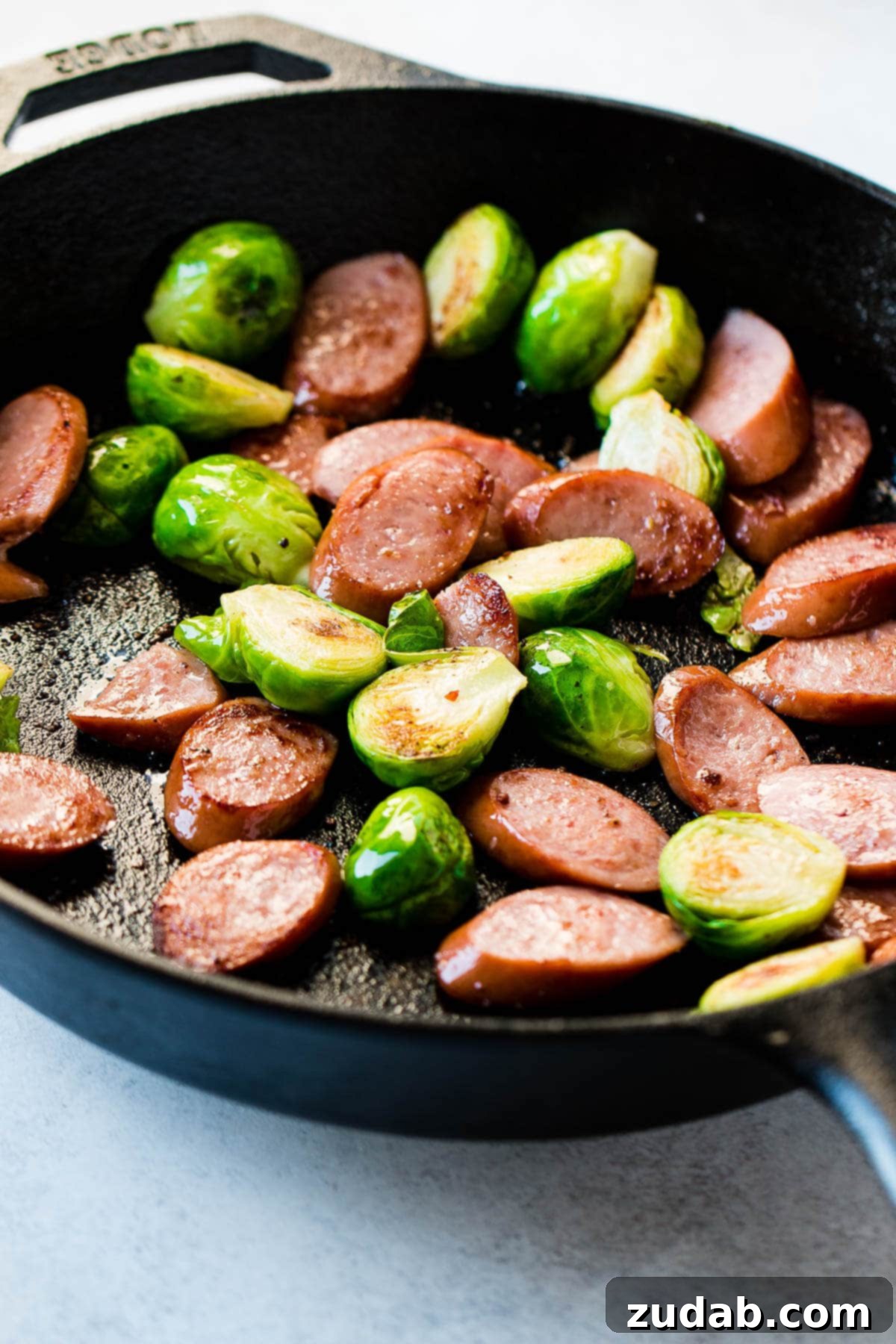 One Pan Cheesy Kielbasa Broccoli Rice 4 Brussels sprouts and kielbasa are an easy and perfect combination for a one-skillet meal.