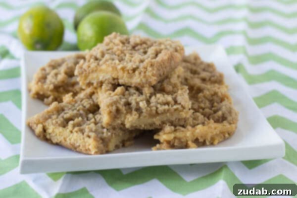 Key Lime Crumble bars. A buttery crust and topping with a creamy, tart lime center ohsweetbasil.com Key Lime Crumble bars. A buttery crust and topping with a creamy, tart lime center from ohsweetbasil.com