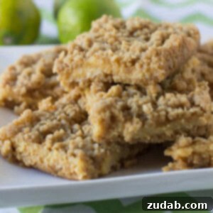 Key Lime Crumble bars. A buttery crust and topping with a creamy, tart lime center ohsweetbasil.com