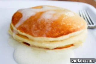 Thoughtful Ways to Celebrate Mom 2 Stack of fluffy Meyer Lemon and Greek Yogurt Pancakes with Meyer Lemon Syrup