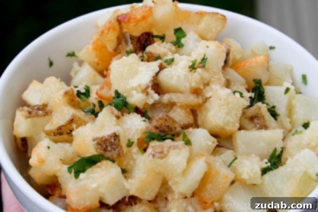 Golden brown Cheesy Potato Bites garnished with fresh parsley