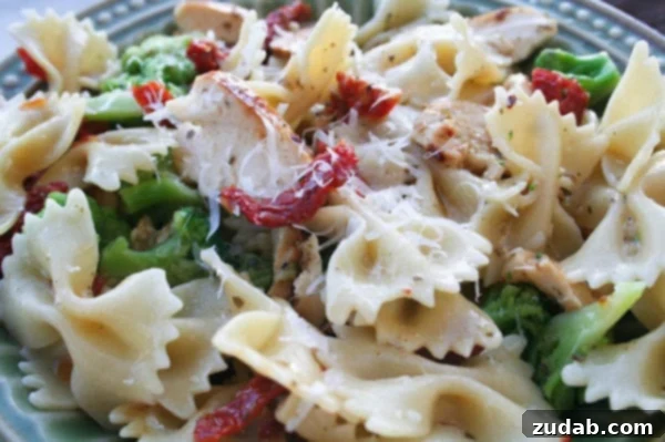 Vibrant Basil & White Balsamic Chicken Pasta 2 Delicious White Balsamic and Basil Chicken Pasta, garnished with fresh basil