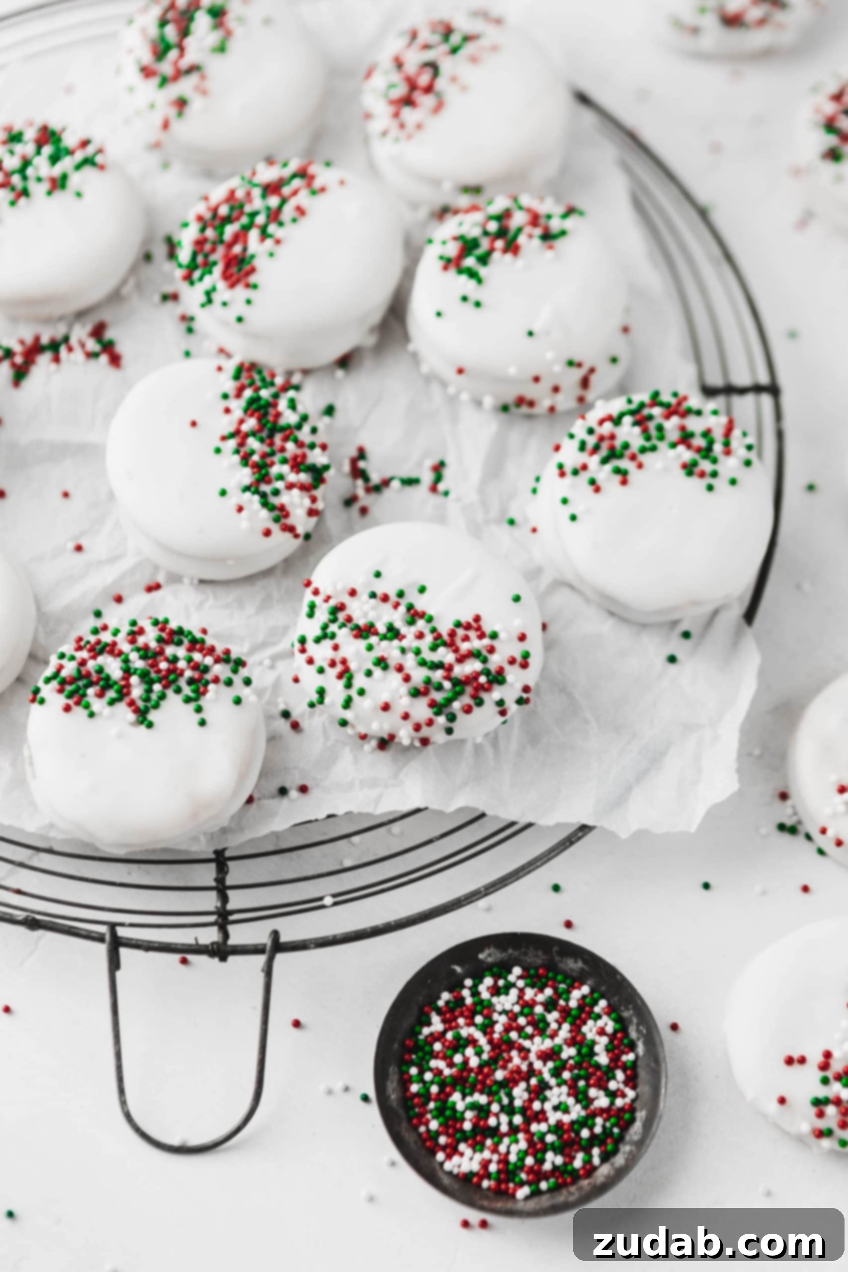 White Chocolate Peanut Butter Crackers The easiest kid friendly holiday candy to make, peanut butter filled ritz crackers then dipped in white chocolate and sprinkles!