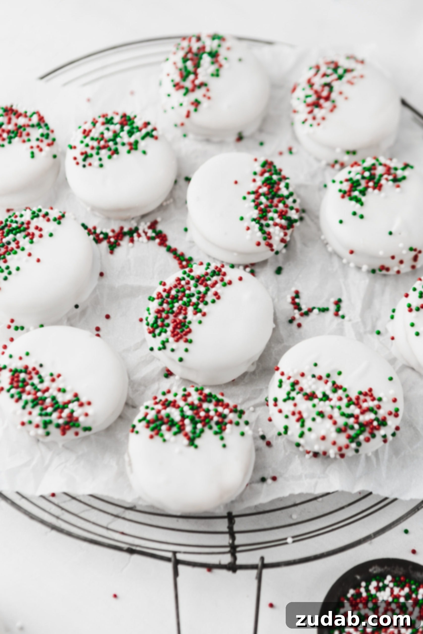 White Chocolate Peanut Butter Crackers The easiest kid friendly holiday candy to make, peanut butter filled ritz crackers then dipped in white chocolate and sprinkles!