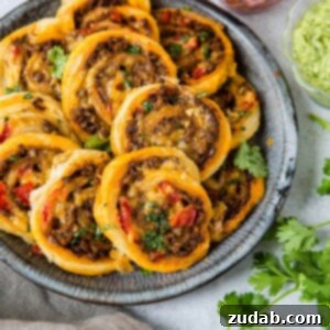 Taco Pinwheels Recipe A Visual Guide 5 Looking for a quick and easy appetizer for football? Taco pinwheels- touchdown! ohsweetbasil.com