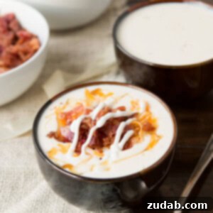 Hearty Golden Baked Potato Soup 2 golden loaded baked potato soup is the best potato soup recipe ever! And you wont guess the secret ingredient! ohsweetbasil.com