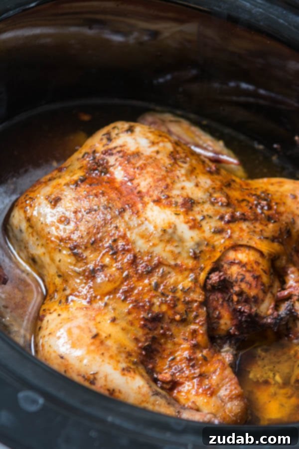 This is the easiest way to enjoy a juicy, rotisserie like chicken by only using a crockpot. Slow cooker whole chicken that anyone can make! insta pot, pressure cooker Whole Chicken in a slow cooker.