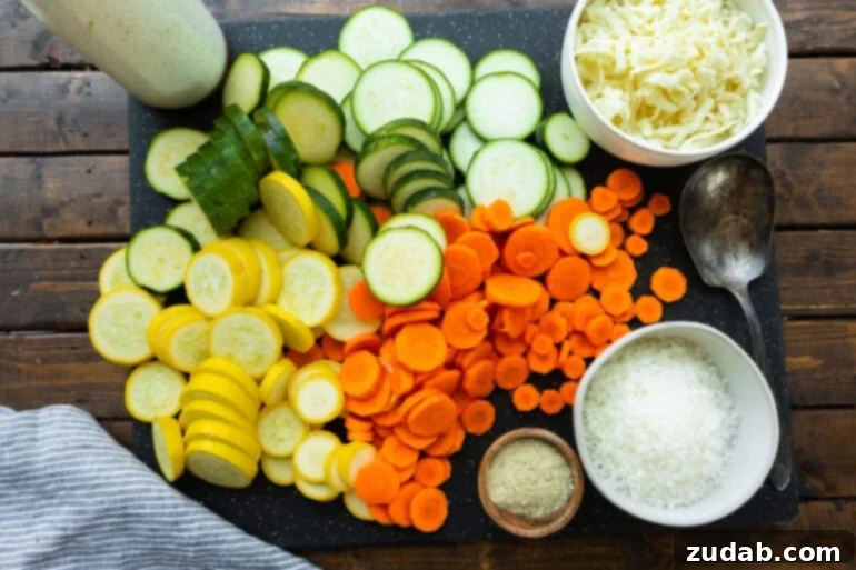 Savory Parmesan Basil Roasted Veggies 3 a photo of all the ingredients need for cheesy basil roasted summer vegetables