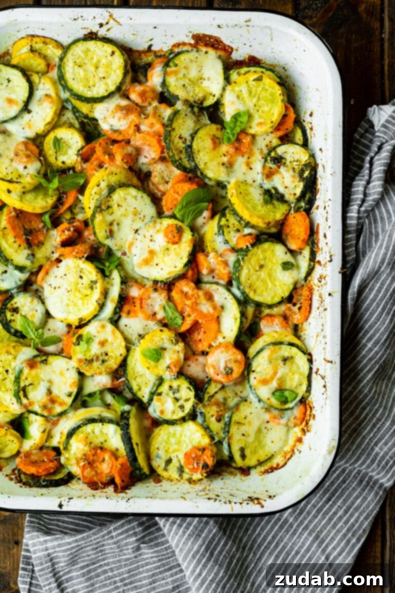 Savory Parmesan Basil Roasted Veggies 7 a photo of baked summer produce with a crispy melty topping