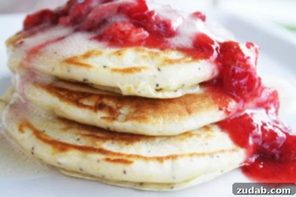 Bright Lemon Poppy Seed Stacks 3 Close-up of fluffy Meyer Lemon Poppy Seed Pancakes with berries