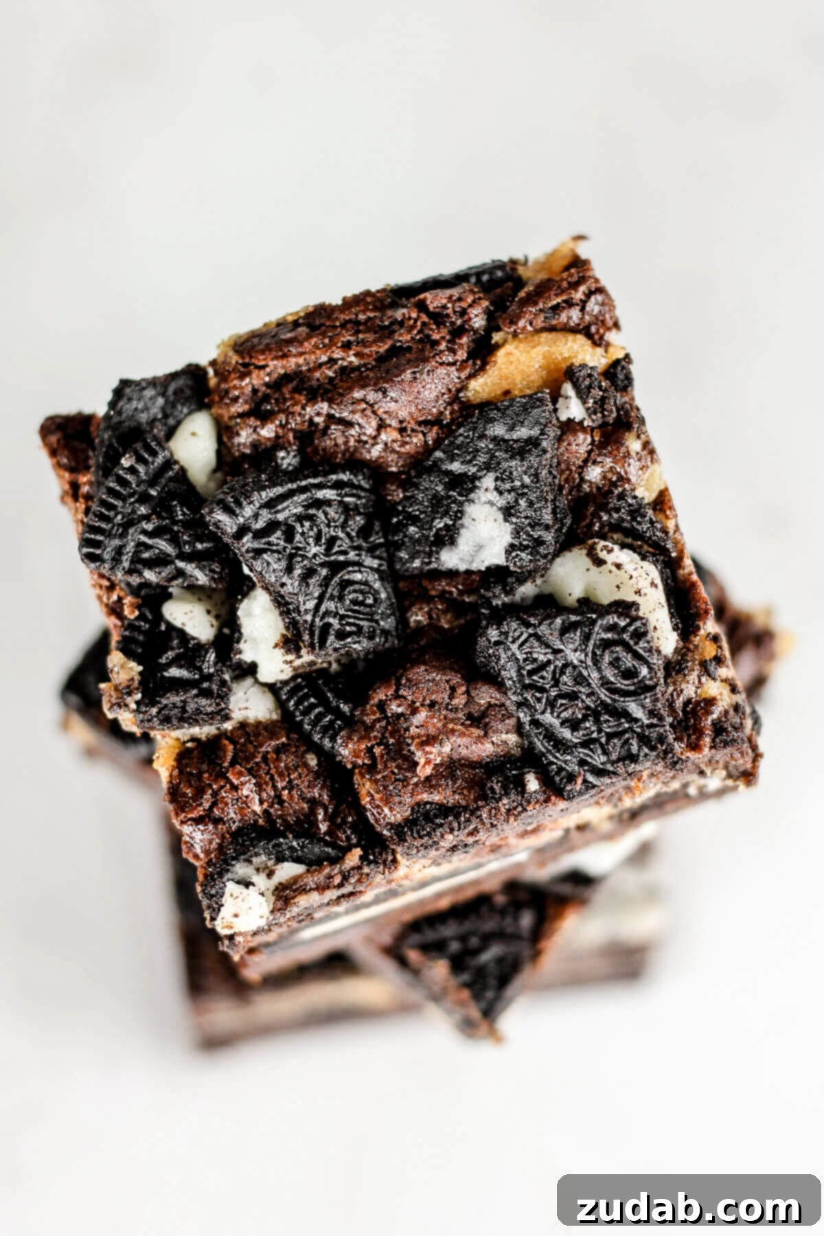 Decadent Peanut Butter Oreo Cheesecake Brownies 5 Close-up of Peanut Butter Cheesecake Oreo Brownies, showcasing the delicious layers