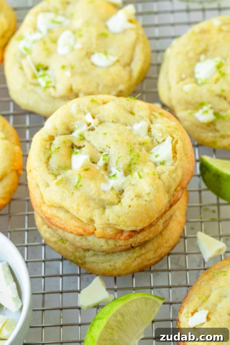 Zesty White Chocolate Key Lime Cookies 6 a photo of a stack of golden baked white chocolate key lime cookies