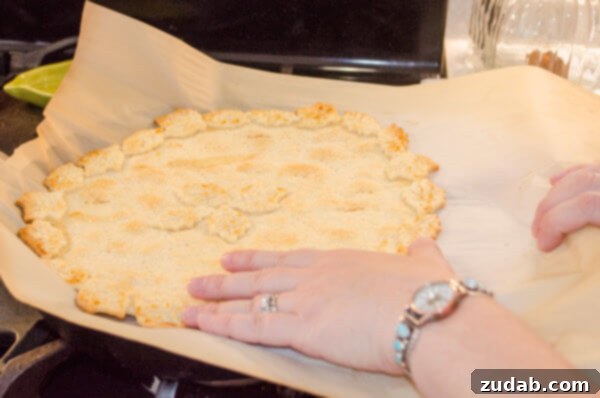 Weeknight Skillet Beef Pot Pie 8 Decorative baked pie crust is placed on top of a 30 Minute Skillet Beef Pot Pie.