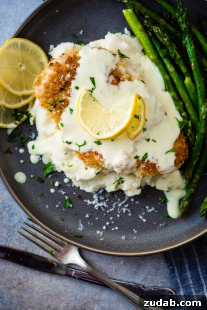 Golden Panko Chicken with Bright Lemon Cream 5 panko breaded chicken topped with creamy lemon sauce atop bed of mashed potatoes