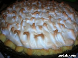 Father's Sweet Selections 5 Classic Lemon Meringue Pie with a tall, fluffy, golden-brown meringue topping