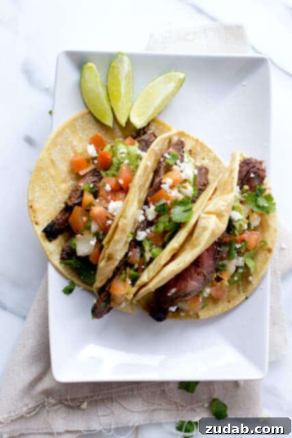 The Ultimate Balsamic Grilled Flank Steak 3 Delicious marinated Carne Asada Tacos, a recipe from ohsweetbasil.com.