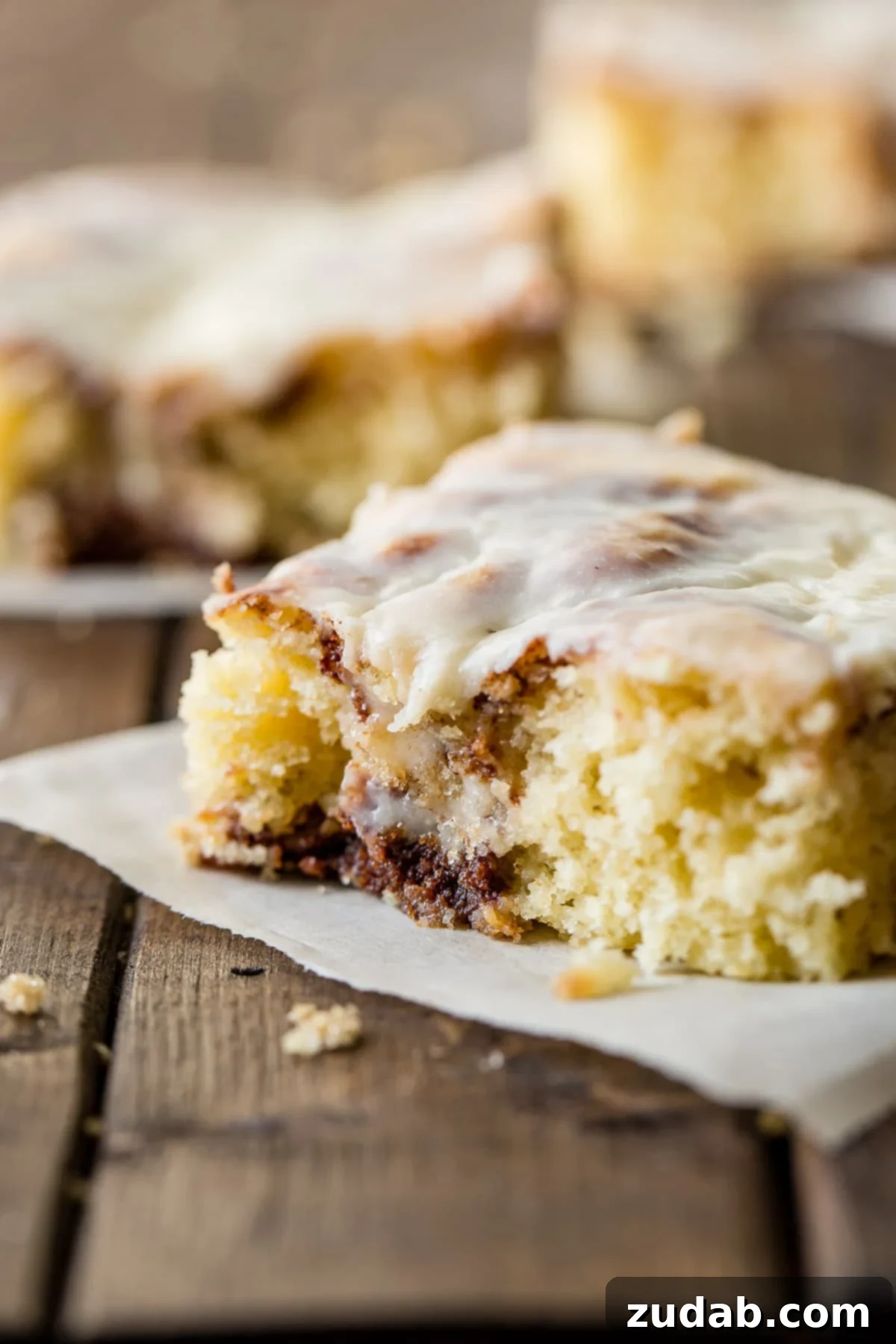 Cinnabon-Style Cinnamon Roll Sheet Cake 2 Indulge in the ultimate Cinnabon Cinnamon Roll Sheet Cake, topped with luscious Cooked Vanilla Cream Cheese Frosting – a perfect dessert for any occasion!