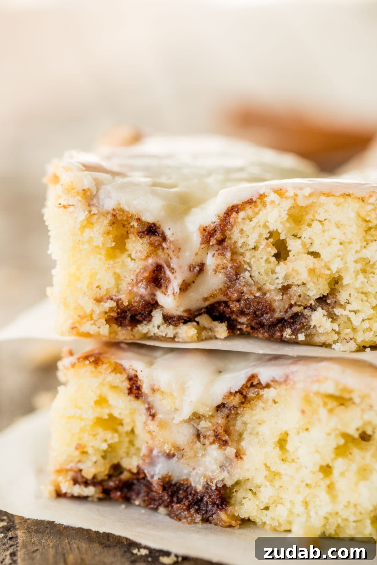 Cinnabon-Style Cinnamon Roll Sheet Cake 3 A Cinnabon Cinnamon Roll Sheet Cake, featuring the signature cinnamon swirls and Cooked Vanilla Cream Cheese Frosting, ready to serve.