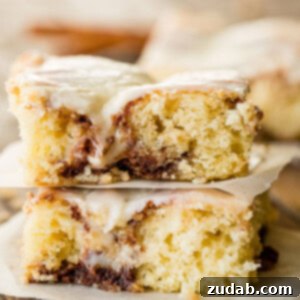 Cinnabon-Style Cinnamon Roll Sheet Cake 8 Cinnabon Cinnamon Roll Sheet Cake with Cooked Vanilla Cream Cheese Frosting