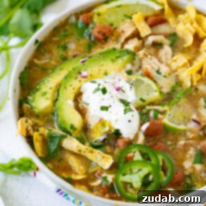 White Chicken Chili in a bowl with toppings