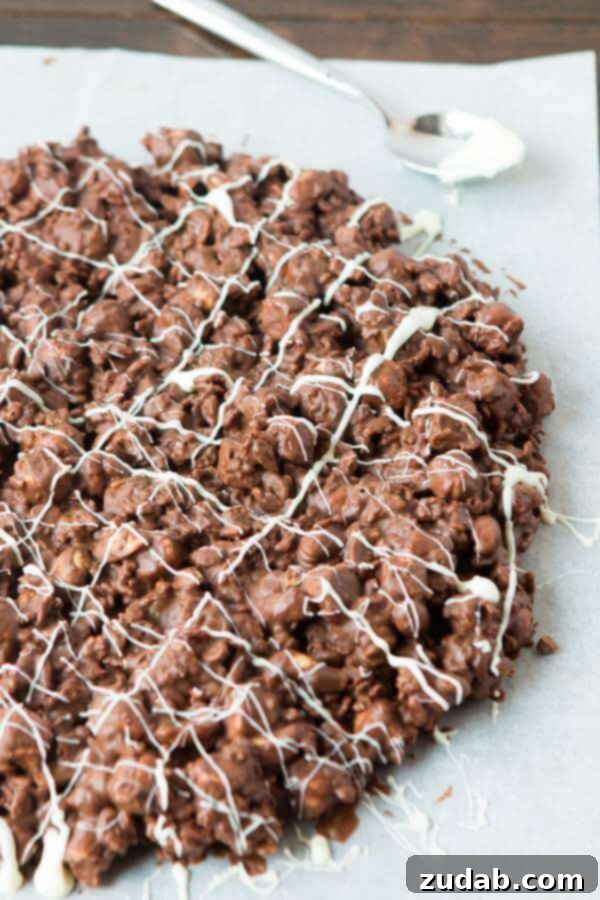 Crunchy, chocolatey, treats! Rocky Road Chocolate Pizza, a simple holiday delight Crunchy, chocolatey, treats! Rocky Road Chocolate Pizza, perfect for holiday gatherings