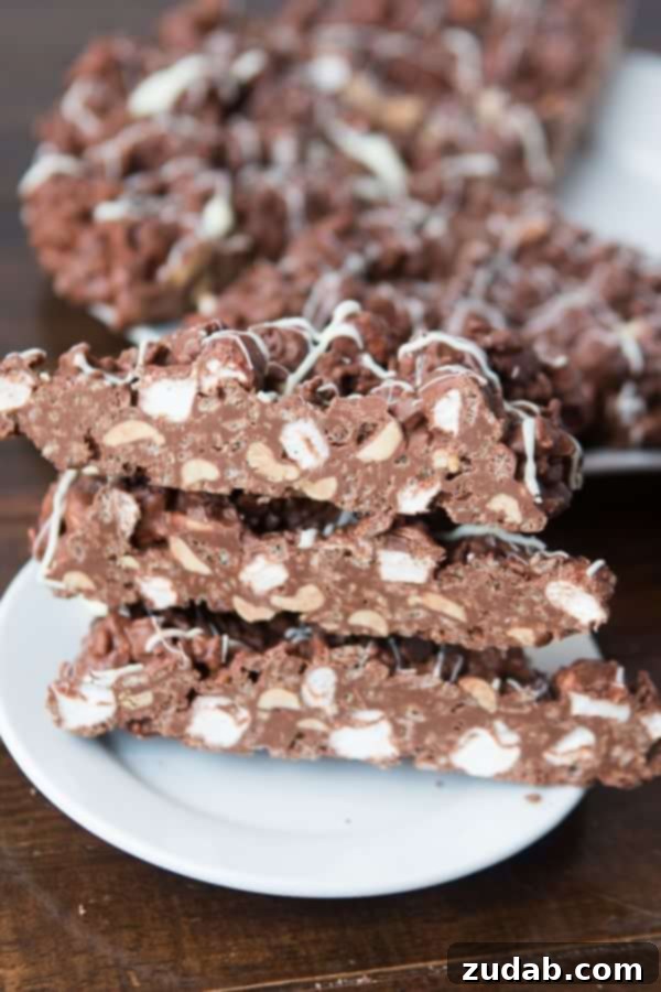 Assortment of rocky road chocolate pizza slices on a platter Assortment of rocky road chocolate pizza slices on a platter