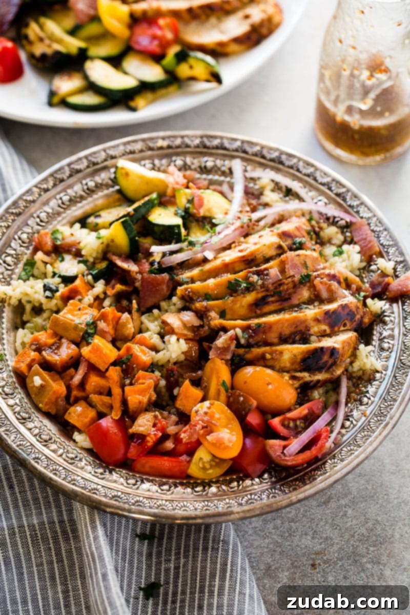Close-up of a vibrant Honey Mustard Chicken with Spinach and Artichoke Rice Bowl, highlighting fresh ingredients and its adaptability for quick, healthy recipes.